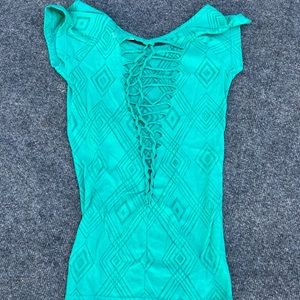 Shear teal cut up shirt
